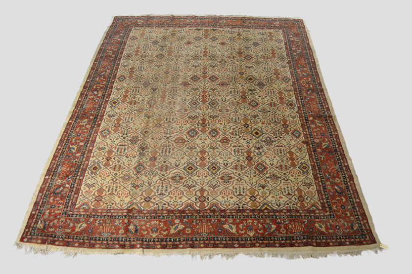 Sparta ivory lattice field carpet, south west Anatolia, circa 1920s, 12ft. 9in. x 10ft. 2in. 3.