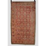 Exceptional Khotan silk rug of all over pomegranate design, east Turkestan, 6ft. 9in. x 3ft. 11in.