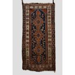 Fars long rug, south west Persia, circa 1920s-30s, 7ft. 4in. x 3ft. 8in. 2.24m. x 1.12m. Overall