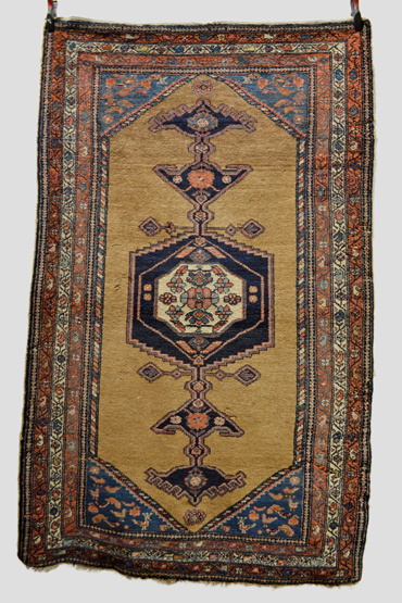 Kurdish camel field rug, north west Persia, about 1920s, 7ft. 5in. x 4ft. 9in. 2.26m. x 1.45m.