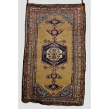 Kurdish camel field rug, north west Persia, about 1920s, 7ft. 5in. x 4ft. 9in. 2.26m. x 1.45m.