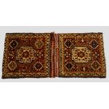 Qashqa’i khorjin, Fars, south west Persia, about 1920s, 3ft. 11in. x 1ft. 10in. 1.20m. x 0.55m.