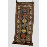 Good Kurdish runner, Kurdistan, north west Persia, early 20th century, 10ft. 3in. x 4ft. 4in. 3.12m.