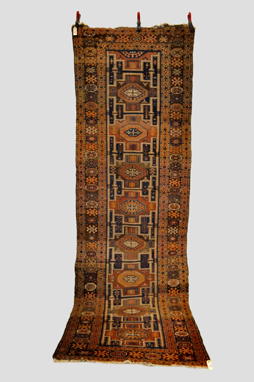 Kurdish runner, north west Persia, circa 1920s, 11ft. 7in. x 3ft. 9in. 3.53m. x 1.14m. Overall