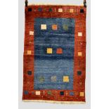 Gabbeh rug, Fars province, south west Persia, modern, 4ft. 2in. x 2ft. 9in. 1.27m. x 0.84m. Rich