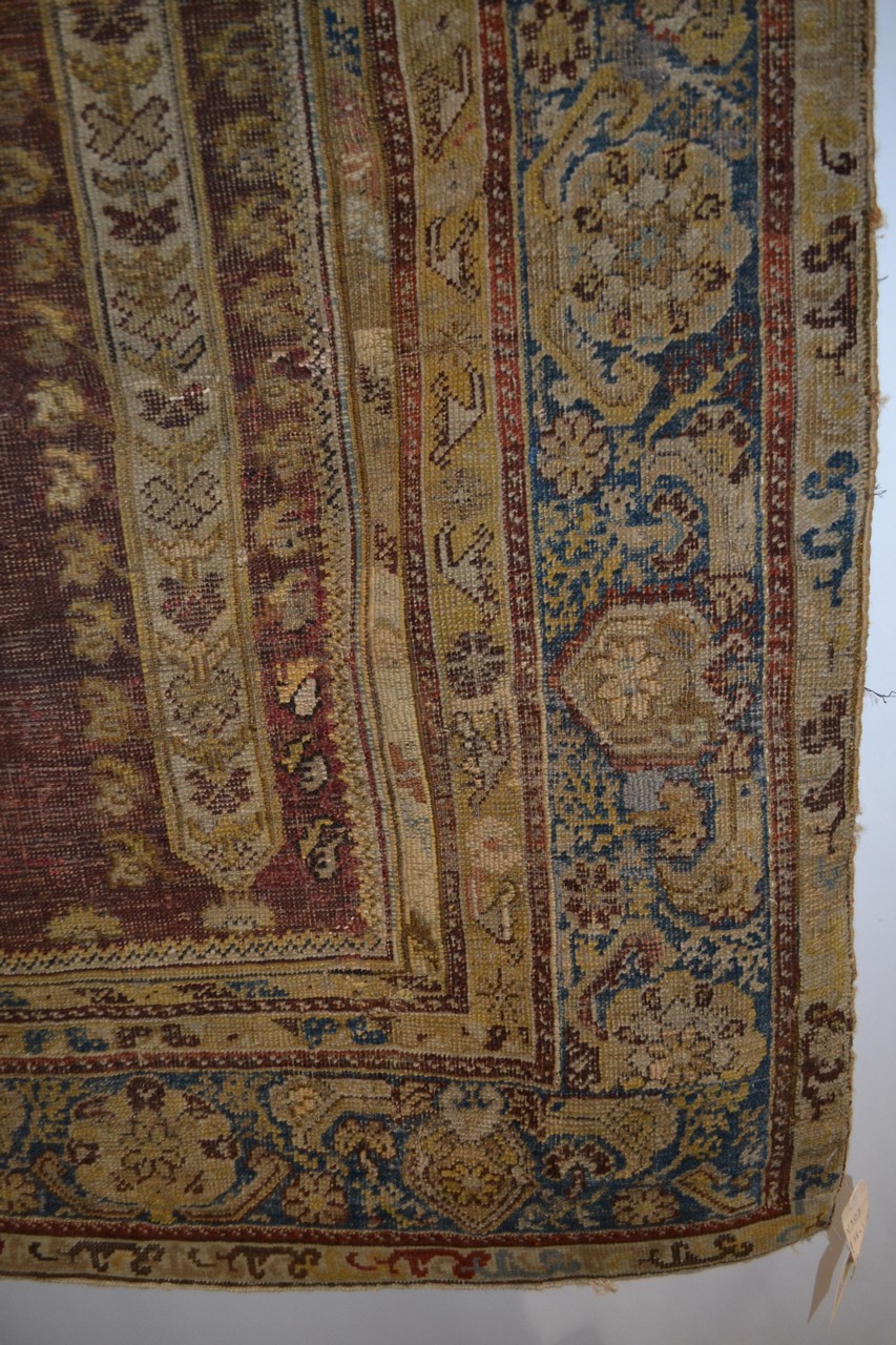 Ghiordes prayer rug, west Anatolia, 18th century, 5ft. 10in. x 4ft. 2in. 1.78m. x 1.27m. Overall - Image 7 of 8