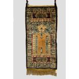 Chinese silk and gold coloured metal thread prayer rug, 20th century, 4ft. 7in. x 2ft. 3in. 1.40m. x