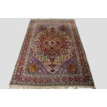 Kerman carpet, south west Persia, 1930-40s, 13ft. 3in. x 8ft. 10in. 4.04m. x 2.69m. Overall uneven