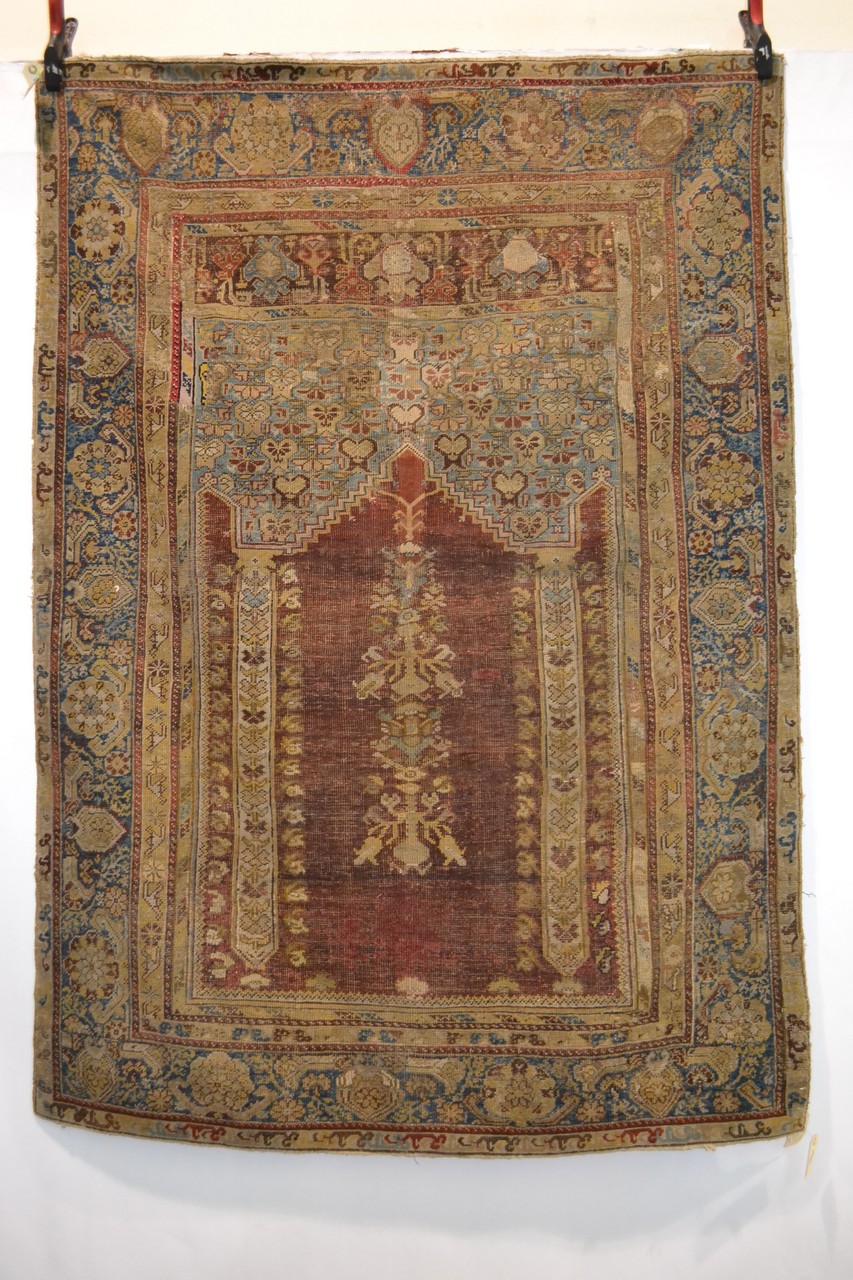 Ghiordes prayer rug, west Anatolia, 18th century, 5ft. 10in. x 4ft. 2in. 1.78m. x 1.27m. Overall - Image 2 of 8