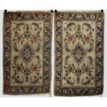 Pair of Tabriz rugs with inscriptions, north west Persia, about 1930s, 4ft. 8in. x 2ft. 9in. 1.42mn.