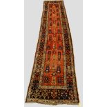 Exceptional Kurdish runner, north west Persia, early 20th century, 15ft. 8in. x 3ft. 6in. 4.77m. x