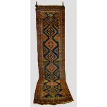 Kurdish runner, Kurdistan, north west Persia, circa 1920s-30s, 13ft. 4in. x 3ft. 4in. 4.06m. x 1.