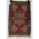 Kerman mat, south west Persia, mid-20th century, 2ft. 11in. x 1ft. 11in. 0.89m. x 0.57m. Slight wear