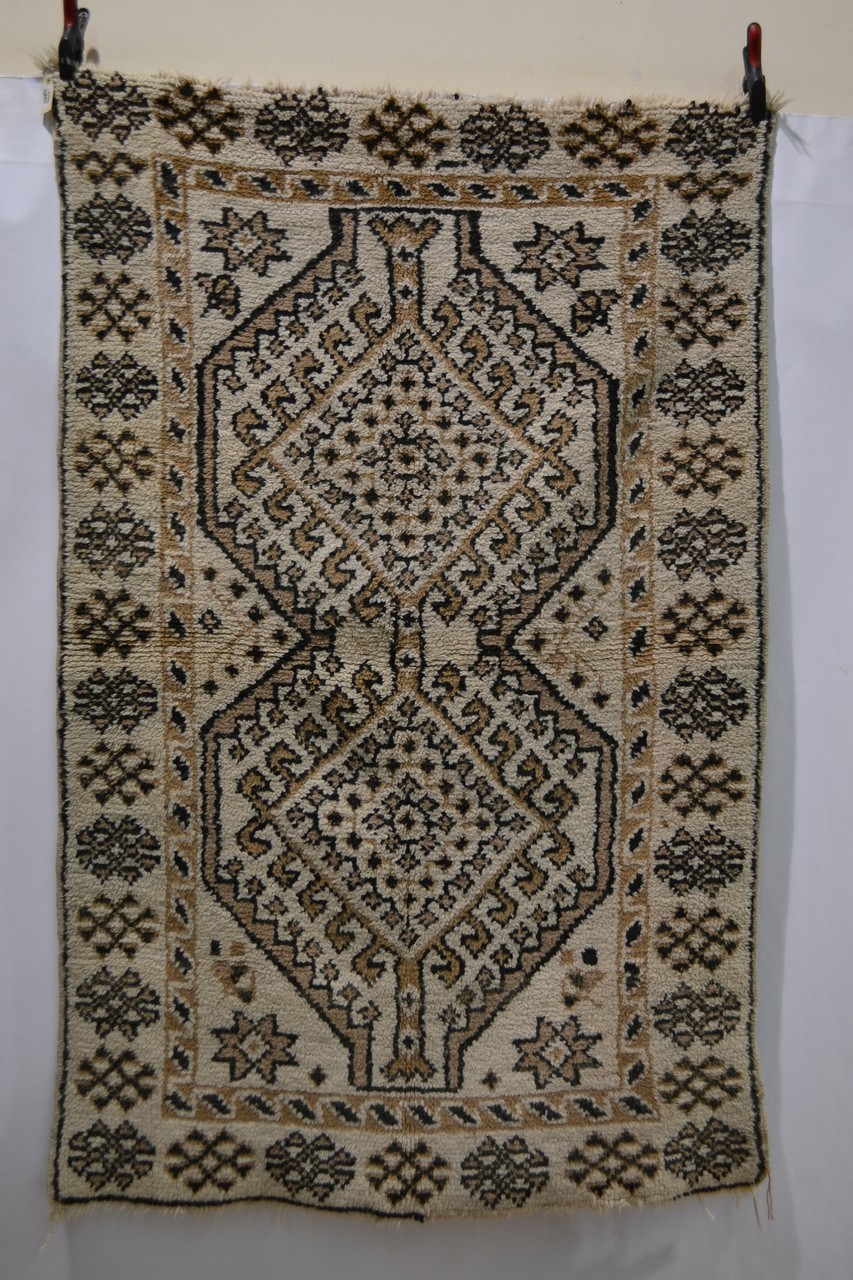 Beni Ouarain rug, Middle Atlas, Morocco, mid-20th century, 6ft. 3in. x 4ft. 1.91m. x 1.22m. Losses