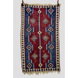 Five Anatolian kelims, all modern, the first with narrow centre pole medallion and ivory border,