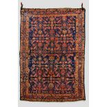 Hamadan rug, north west Persia, circa 1930s, 6ft. 11in. x 4ft. 11in. 2.11m. x 1.50m. Overall wear.