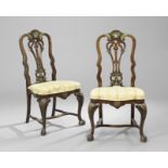 Pair of Parcel-Gilt Carved Mahogany Sidechairs, in the Portuguese rococo style, h. 41-3/4".