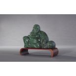 Chinese Carved Hardstone Buddha, 20th century, the deep green figure of Budai seated, with an