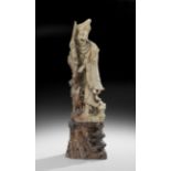 Chinese Soapstone Carving of a Laughing Immortal, late 19th/early 20th century, the beige stone with