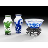 Three Pieces of Chinese Peking Glass, 20th century, including two vases, h. 6-1/4", and a bowl, dia.