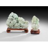 Two Chinese Jade Carvings, 19th/20th century, the two pale green carvings with green inclusions, one