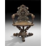 Unusual Italian Oak Revolving Armchair, early 20th century, the scrolling and foliate-pierced back