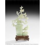 Chinese Carved Jade Group, Qing Dynasty (1644-1911), 19th/20th century, depicting a vase of
