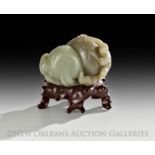 Chinese Carved Celadon Jade Group of a Monkey and Peaches, Qing Dynasty (1644-1911), probably 18th