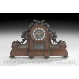 French Oak and Patinated Bronze Mantel Clock of Louis XIV Inspiration, third quarter 19th century,