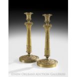 Handsome Pair of French Restauration Gilt-Bronze Candlesticks, second quarter 19th century, the base