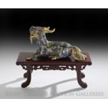 Chinese Cloisonne Figure of a Recumbent Qilin on Stand, Qing Dynasty (1644-1911), late 19th/early