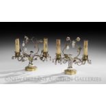 Pair of French Brass and Porcelain Two-Light Candelabra, first quarter 20th century, one with a