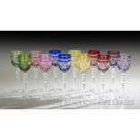 Set of Twelve Bohemian Molded Crystal Goblets, the bowls of the goblets variously decorated with