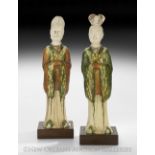 Two Chinese Sancai Pottery Figures of Civic Officials, Tang Dynasty (618-906), probably 8th century,