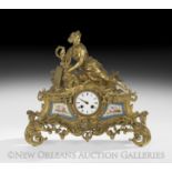 Louis-Philippe Gilt-Bronze and Porcelain Mantel Clock, mid-19th century, on pierced scrollwork feet,