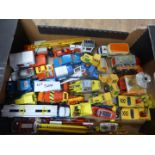 Large box of Corgi – various vehicles, tractors, trucks, cranes etc, all playworn, large lot.