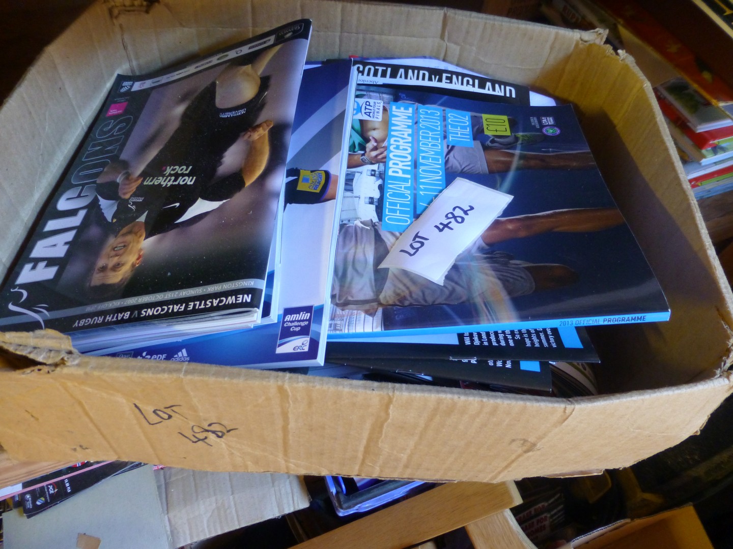 Box of 100+ modern and glossy programmes, incl Tennis, Rugby, Football.