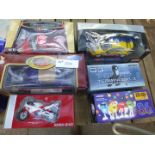 Large box of cars incl Peugeot 206, WRC, Terminator 3 T850, Ford 1932 Roadster, Robobike, Ken