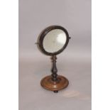 A George IV mahogany shaving mirror the