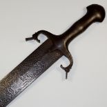 A 19th Century Persian Medieval revival broad sword with steel handle the blade engraved with