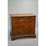 A George I walnut chest of drawers the t