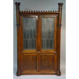 A mid Victorian "Gothic" rosewood bookca