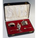 A George III style three piece cruet set