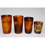 Four horn beakers, all tapered cylindric