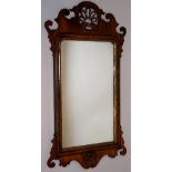 A George III fretted frame wall mirror t