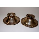 A pair of Continental .835 candlesticks