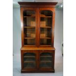 A Victorian  mahogany bookcase the flare