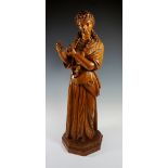 A Victorian oak carved figure of a young