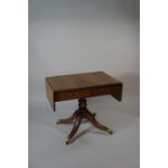 A Regency mahogany sofa table the rounde