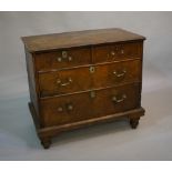 A George I walnut chest of drawers the t